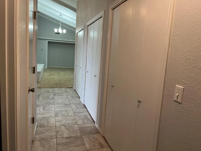 a bathroom with a glass door shower