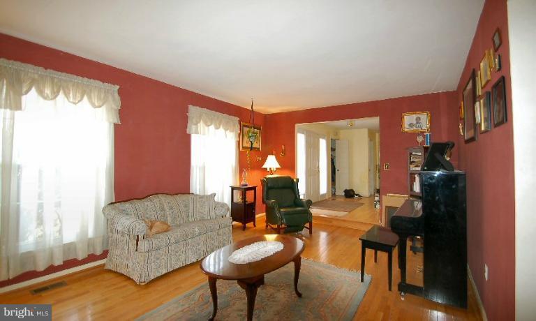 2314 Falling Creek Road Silver Spring, MD 20904 - Photo 12 of 16 a living room with furniture and a large window