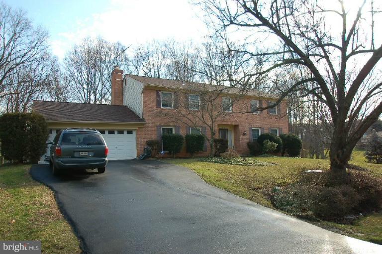 2314 Falling Creek Road Silver Spring, MD 20904 - Photo 3 of 16 a car parked in front of white house