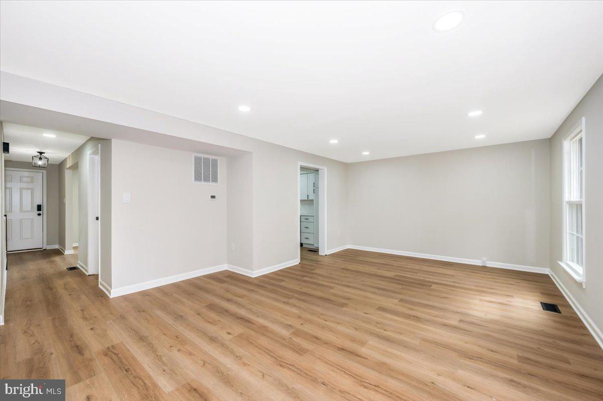 8200 Red Wing Court Frederick, MD 21701 - Photo 12 of 40 a view of empty room with wooden floor
