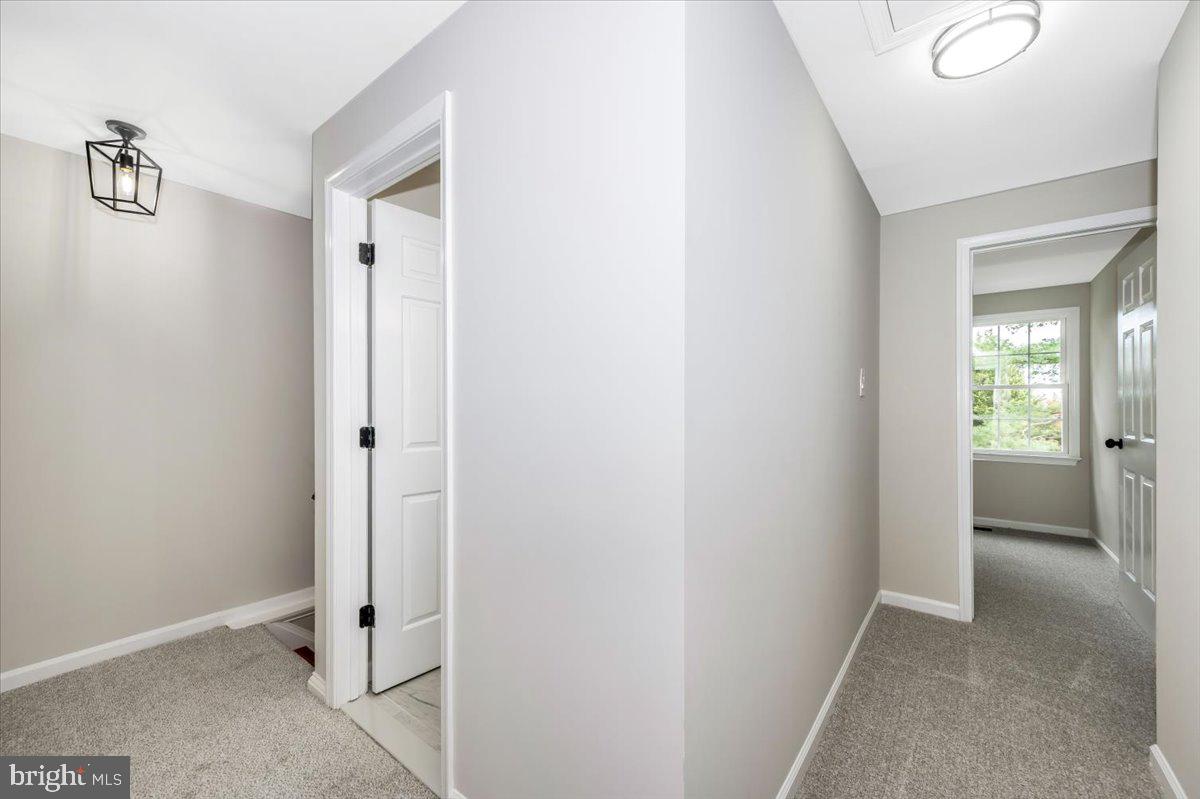 8200 Red Wing Court Frederick, MD 21701 - Photo 16 of 40 a view of a hallway with closet and a livingroom view