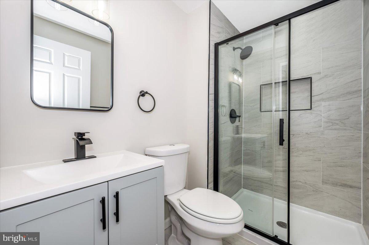 8200 Red Wing Court Frederick, MD 21701 - Photo 20 of 40 a bathroom with a sink toilet and shower