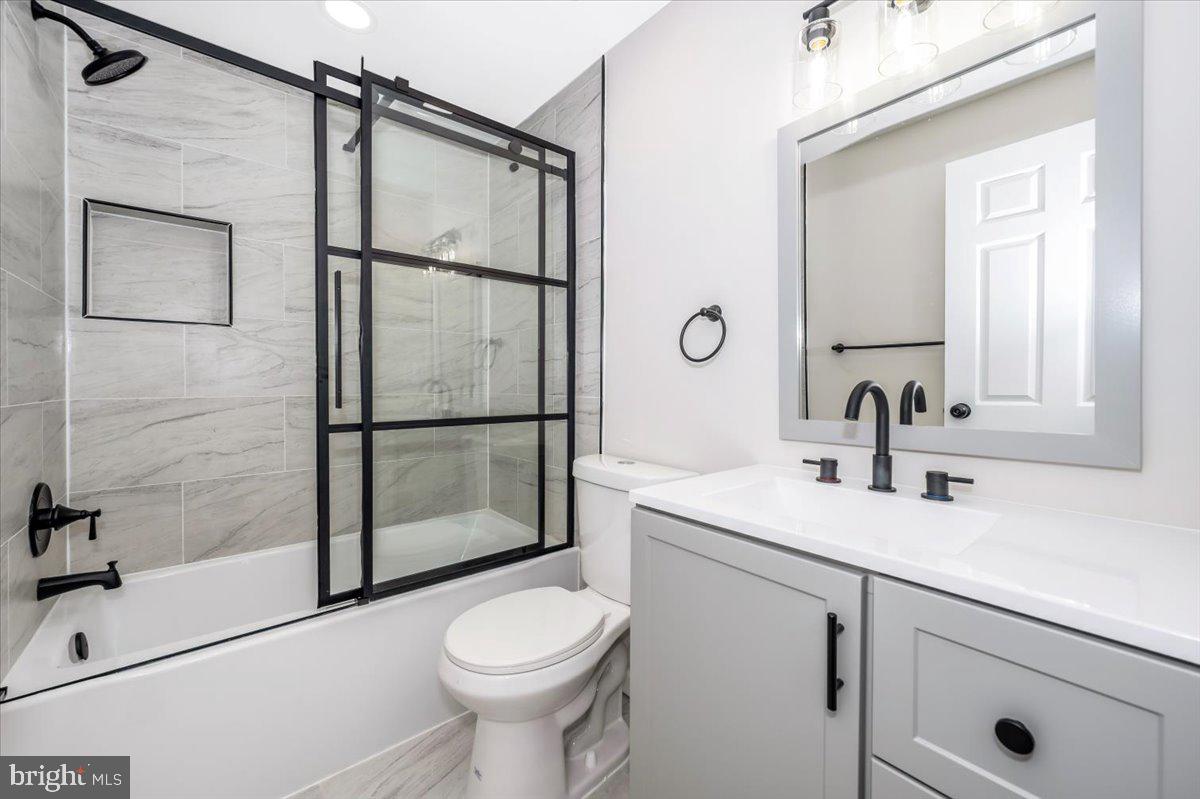 8200 Red Wing Court Frederick, MD 21701 - Photo 27 of 40 a bathroom with a sink toilet and shower