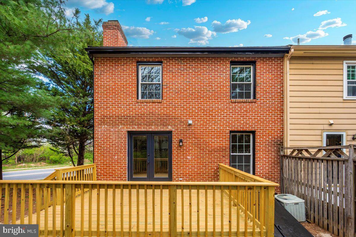 8200 Red Wing Court Frederick, MD 21701 - Photo 36 of 40 a front view of a house with a yard