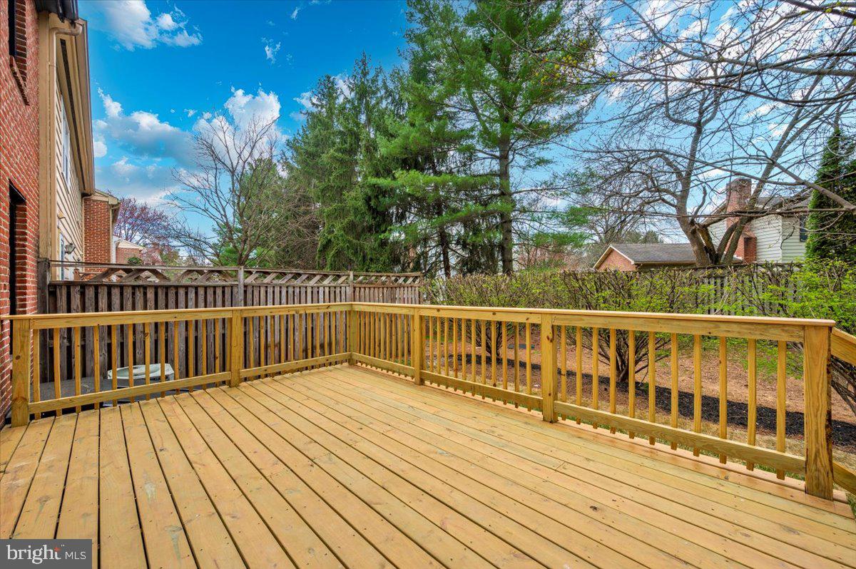 8200 Red Wing Court Frederick, MD 21701 - Photo 39 of 40 a view of balcony with wooden floor and fence