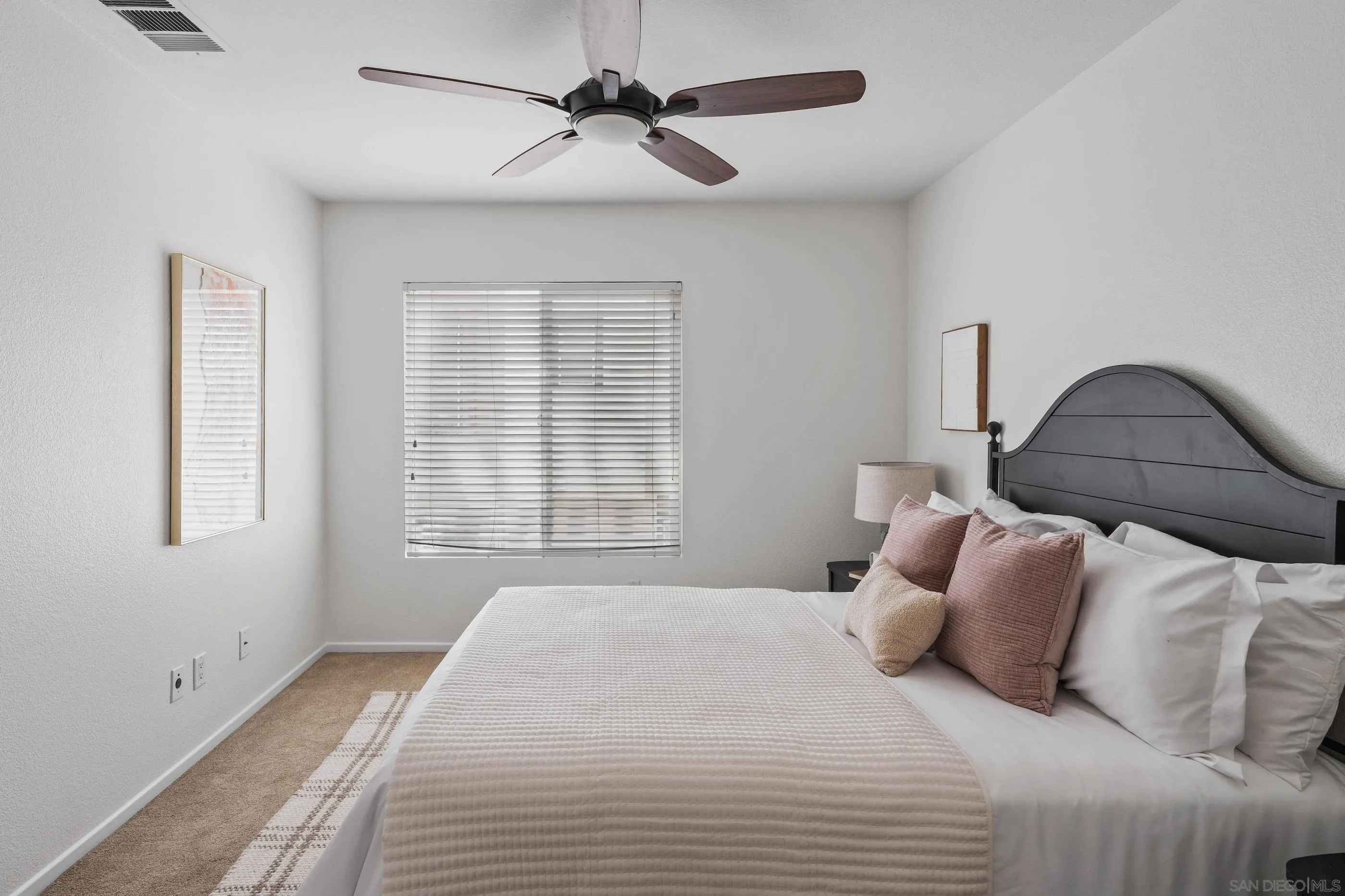 489 Almond Road San Marcos, CA 92078 - Photo 11 of 25 a bedroom with a bed and a window