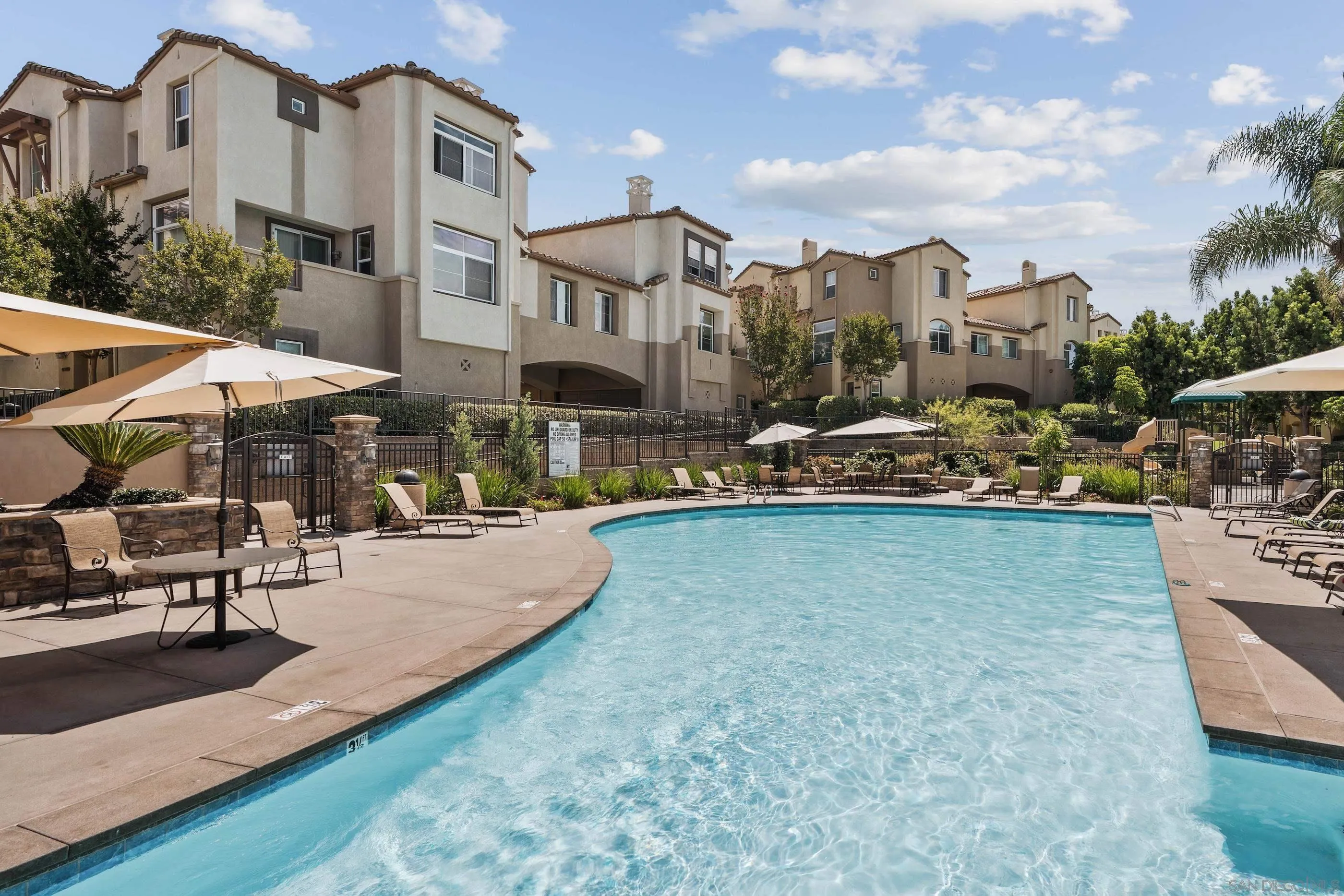 489 Almond Road San Marcos, CA 92078 - Photo 20 of 25 a view of a patio with swimming pool table and chairs