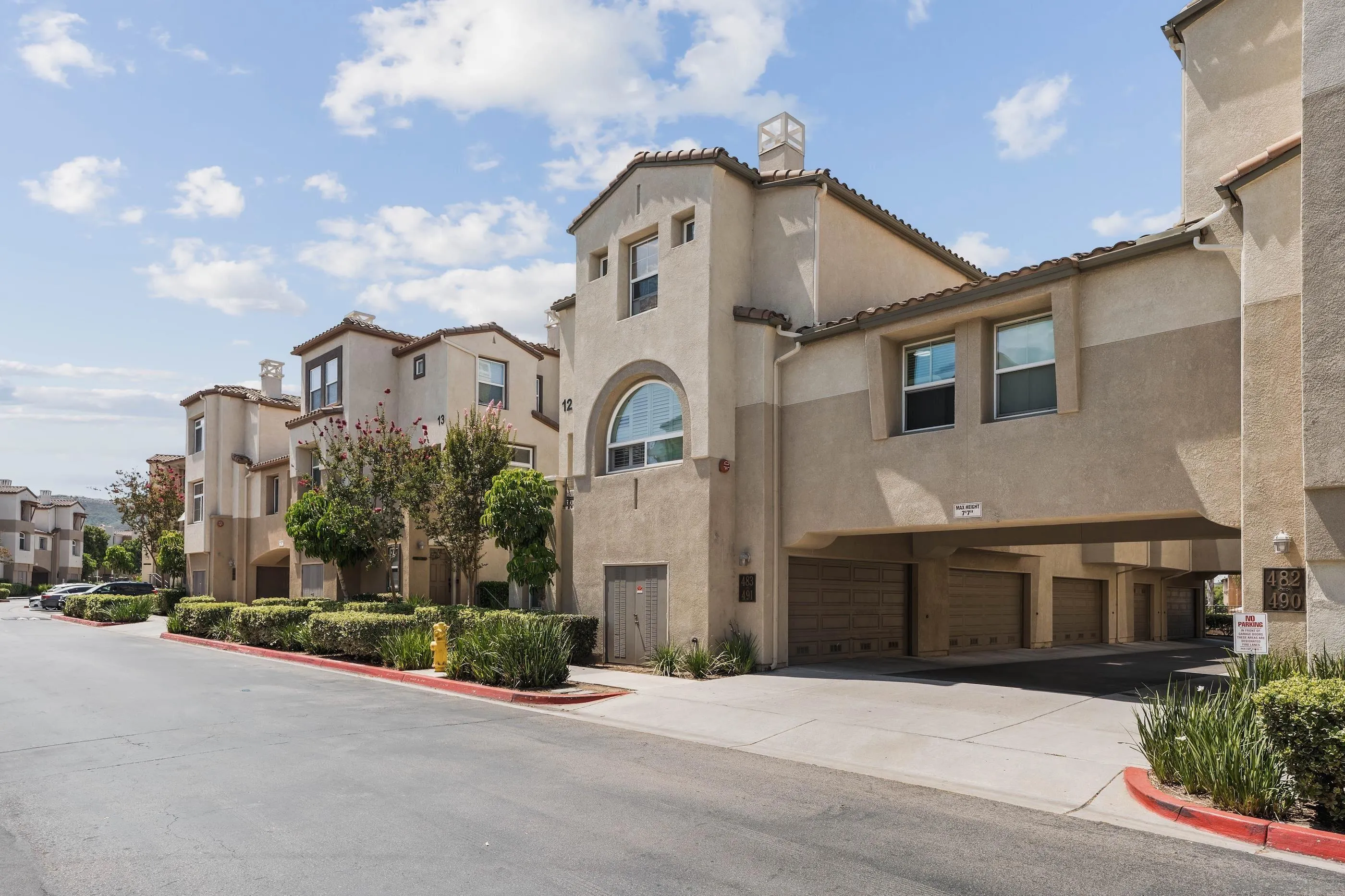 489 Almond Road San Marcos, CA 92078 - Photo 24 of 25 a front view of a house with a garden