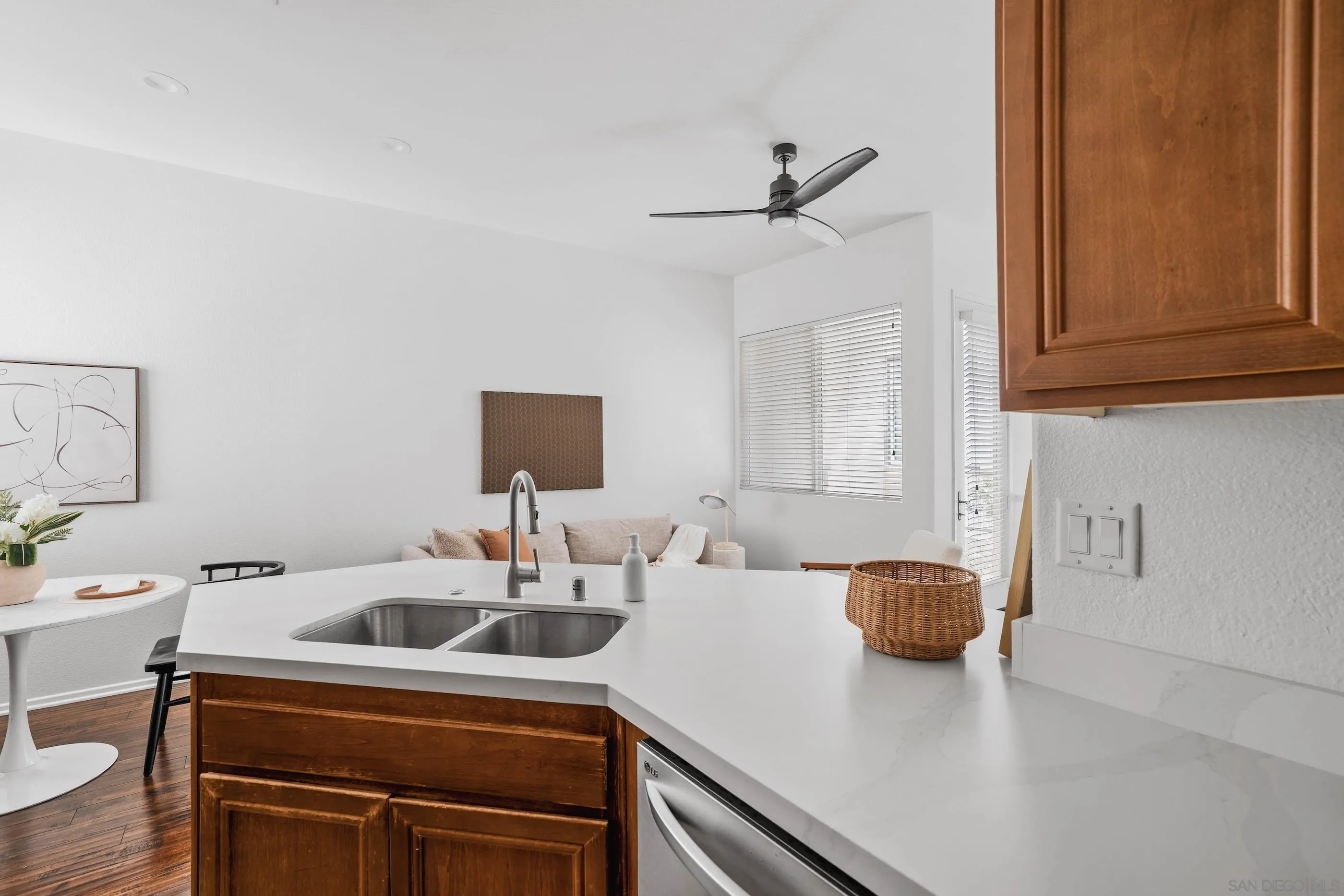 489 Almond Road San Marcos, CA 92078 - Photo 7 of 25 a kitchen that has a sink and a stove in it