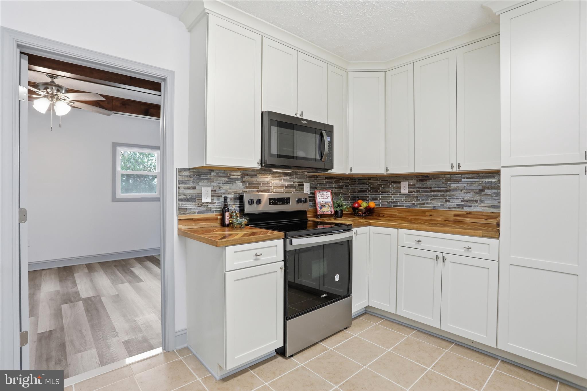 1310 Siler Road Winchester, VA 22603 - Photo 16 of 52 New cabinets, stove and microwave