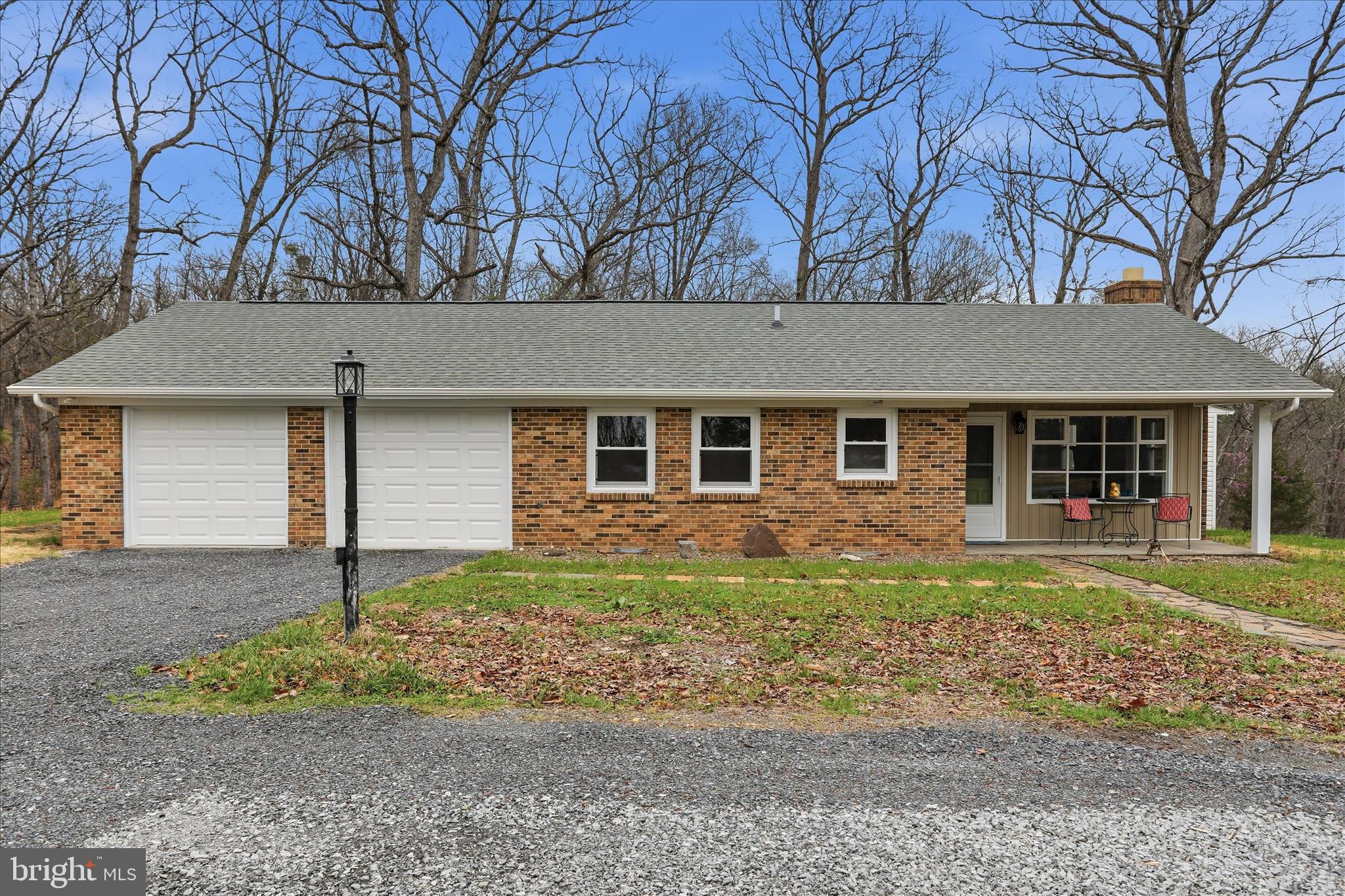 1310 Siler Road Winchester, VA 22603 - Photo 2 of 39 Front porch and attached 2-car garage