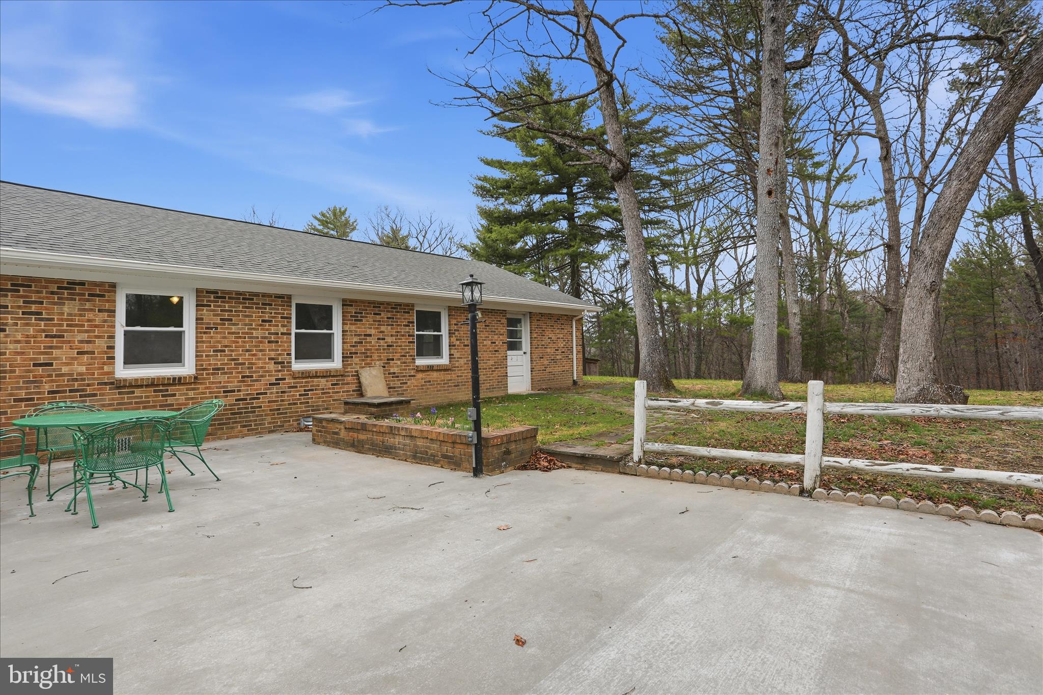 1310 Siler Road Winchester, VA 22603 - Photo 35 of 39 View of patio and back of garage w/door