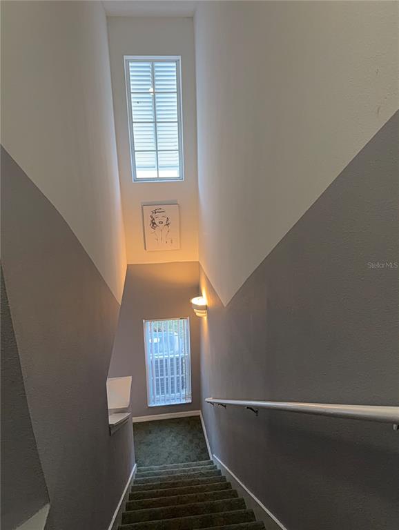 1090 Park Ridge Circle Kissimmee, FL 34746 - Photo 12 of 30 a view of an empty room with a window