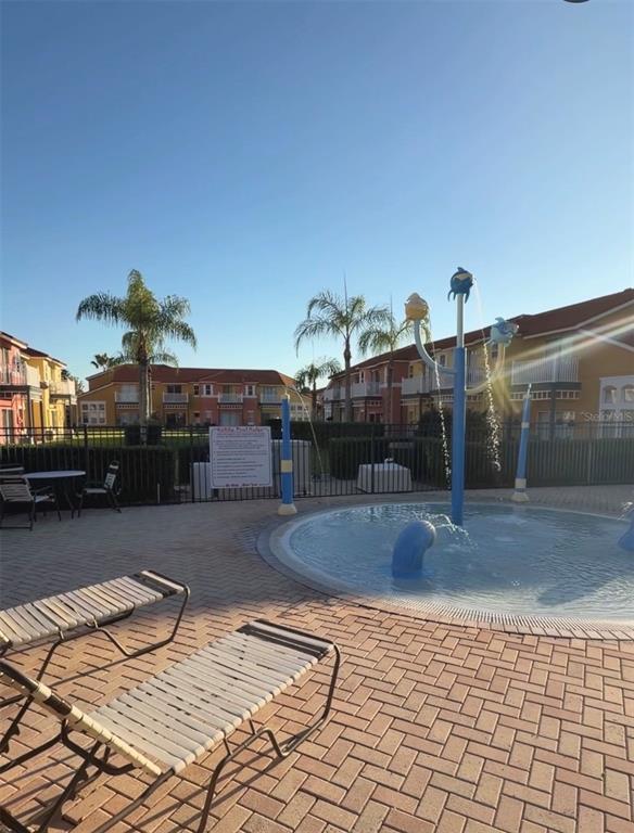 1090 Park Ridge Circle Kissimmee, FL 34746 - Photo 18 of 30 a view of a swimming pool
