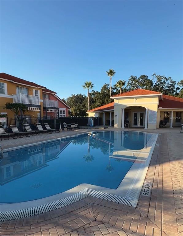 1090 Park Ridge Circle Kissimmee, FL 34746 - Photo 20 of 30 a view of a house with swimming pool