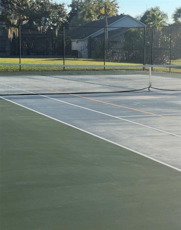 1090 Park Ridge Circle Kissimmee, FL 34746 - Photo 22 of 30 a view of a tennis court