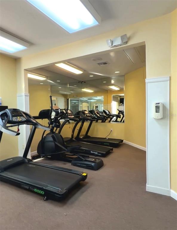 1090 Park Ridge Circle Kissimmee, FL 34746 - Photo 26 of 30 a room with gym equipment