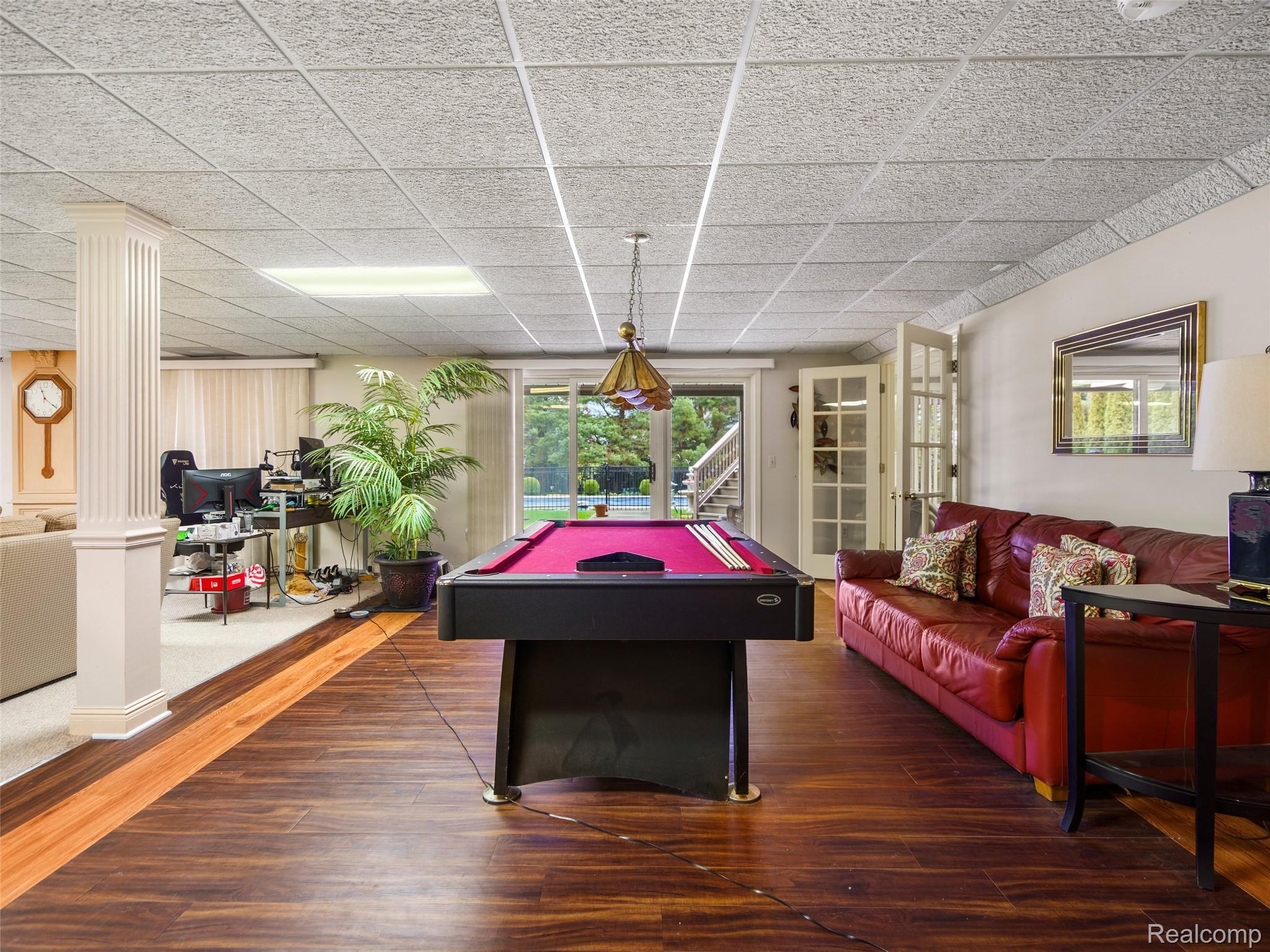 5724 Murfield Drive Rochester, MI 48306 - Photo 94 of 99 Game room featuring dark wood-type flooring, billiards table, and a drop ceiling