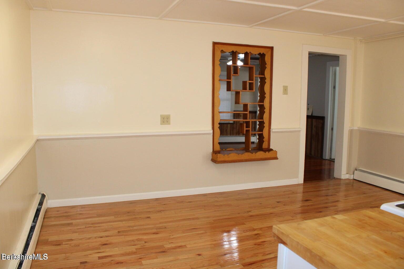 3-5 Pleasant Street Pittsfield, MA 01201 - Photo 14 of 22 a view of a room that has wooden floor