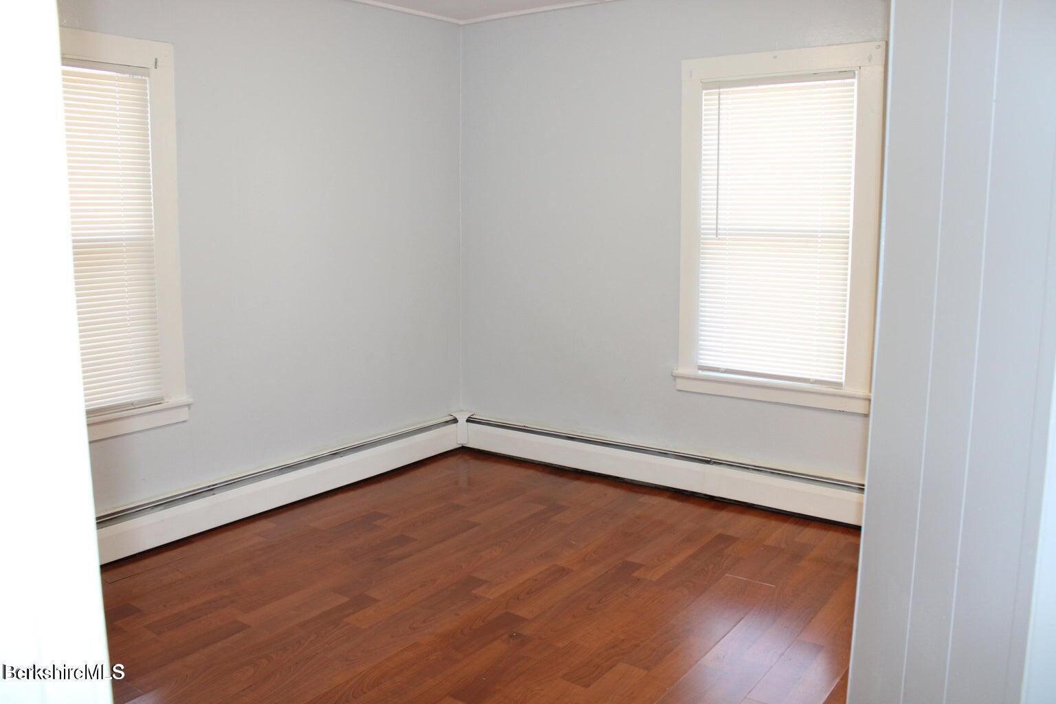 3-5 Pleasant Street Pittsfield, MA 01201 - Photo 8 of 22 an empty room with a window