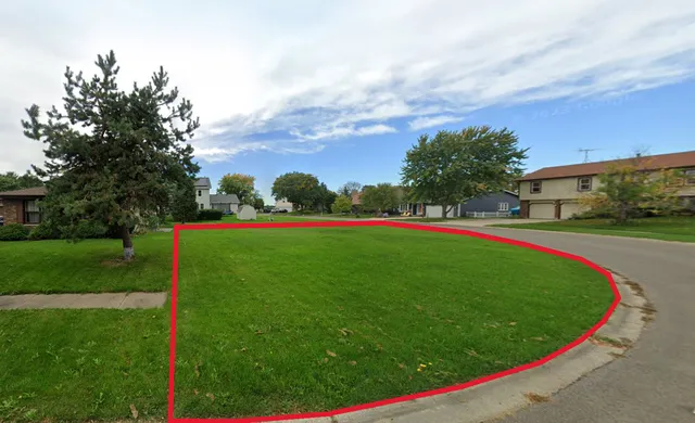a view of a golf course with a garden
