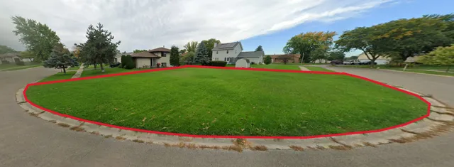 a view of a park with swings and slides