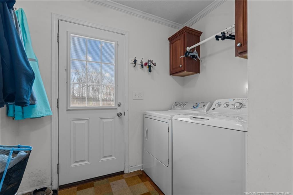 4194 Abattoir Road Angier, NC 27501 - Photo 27 of 50 a utility room with dryer and washer