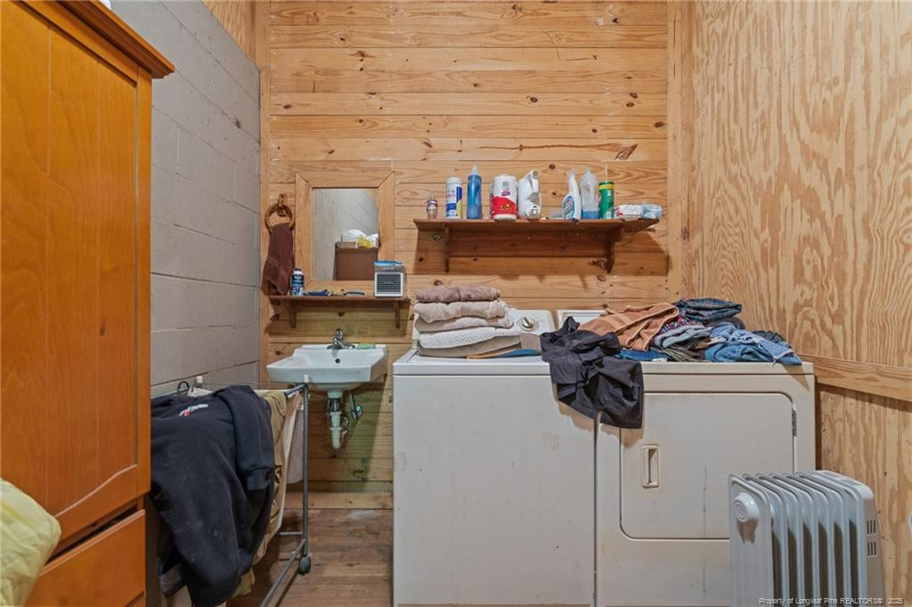 4194 Abattoir Road Angier, NC 27501 - Photo 42 of 50 a kitchen with a stove and a refrigerator