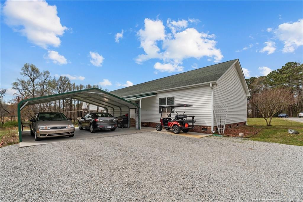 4194 Abattoir Road Angier, NC 27501 - Photo 49 of 50 a view of car parked in front of house