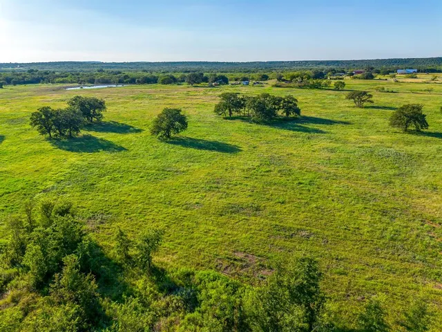 a view of a city with an ocean
