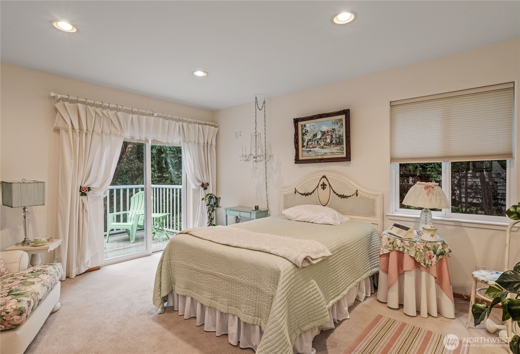 42 Nantucket Place Port Townsend, WA 98368 - Photo 14 of 33 a bedroom with a large bed and a large window