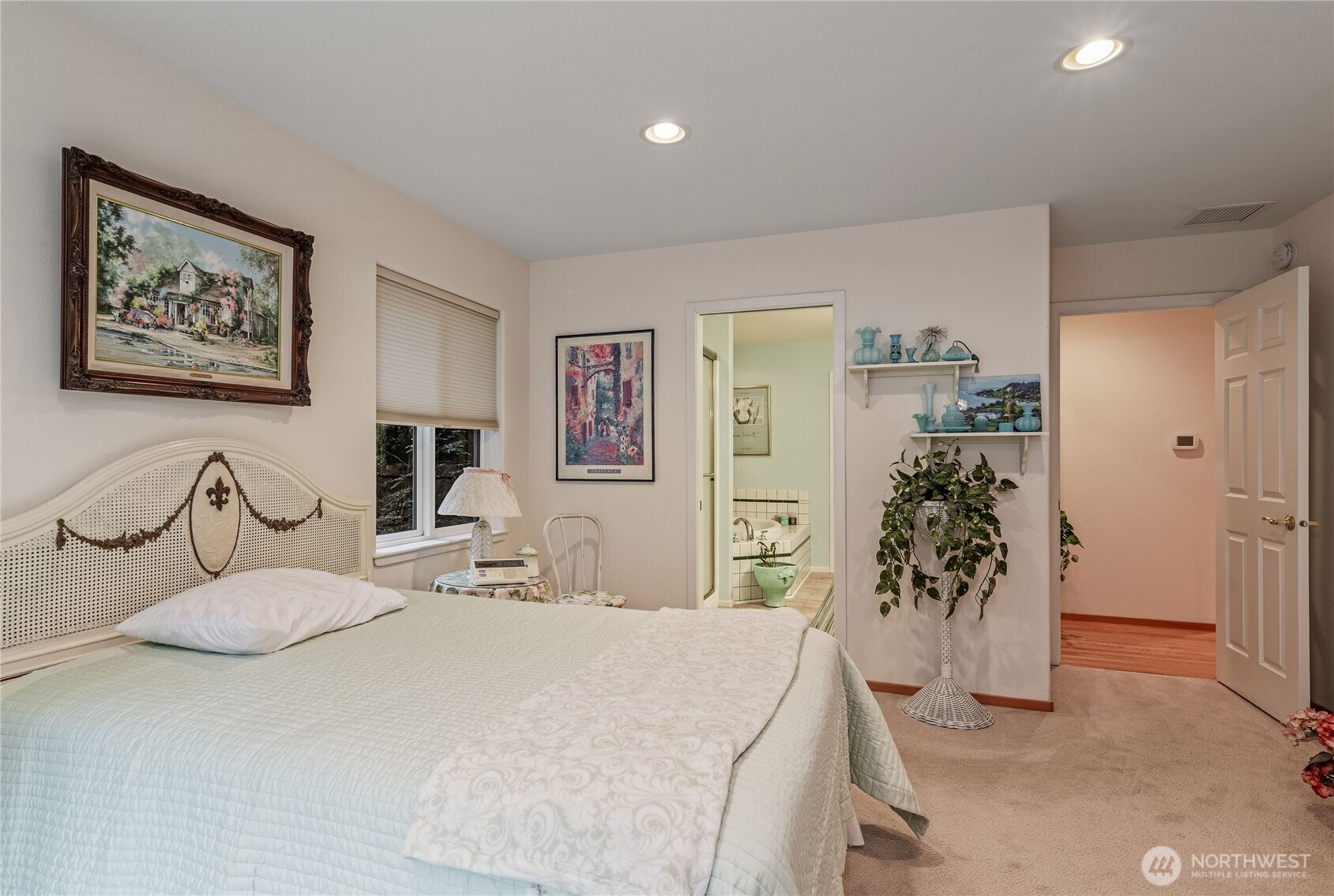 42 Nantucket Place Port Townsend, WA 98368 - Photo 16 of 33 a bedroom with a bed and a large mirror