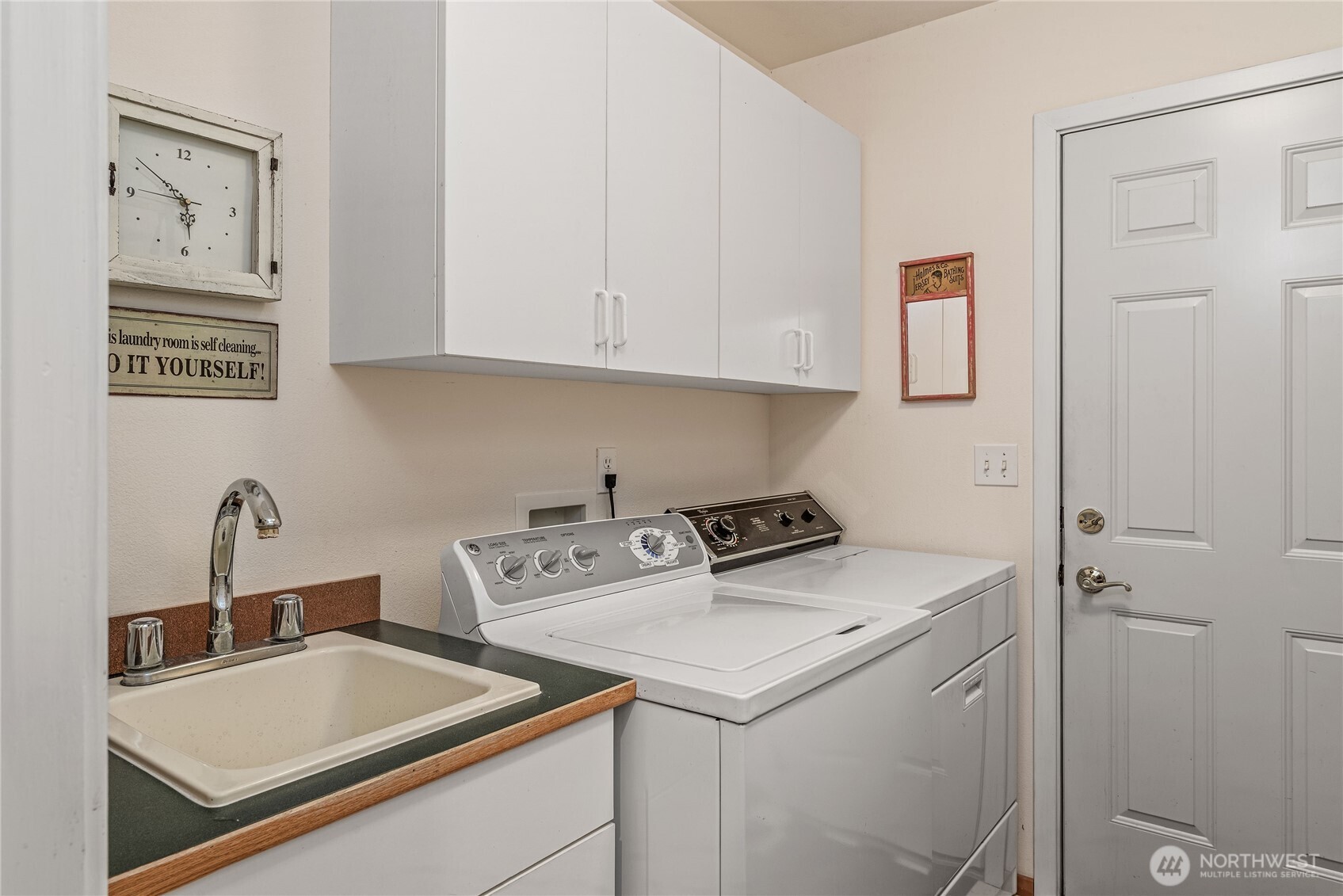 42 Nantucket Place Port Townsend, WA 98368 - Photo 21 of 33 a kitchen with a sink cabinets and appliances