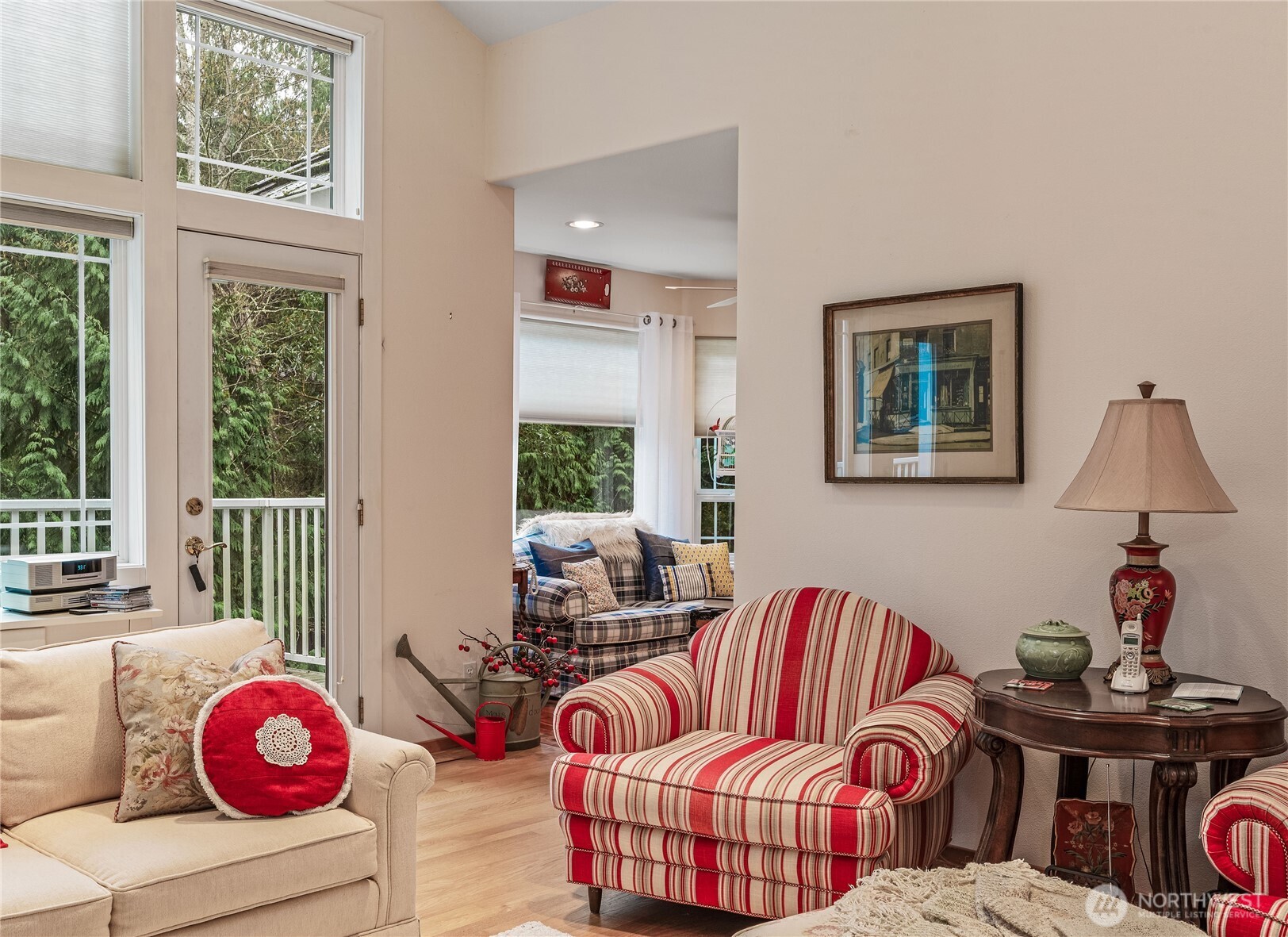 42 Nantucket Place Port Townsend, WA 98368 - Photo 9 of 33 a living room with furniture and a floor to ceiling window