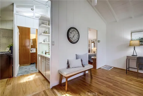 a kitchen with a stove and a refrigerator