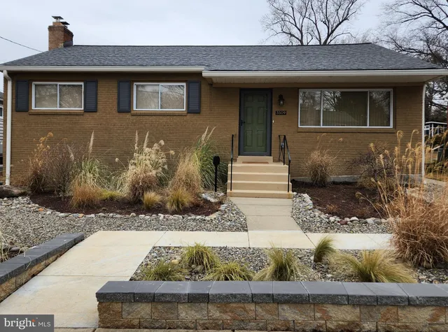 a front view of a house with entertaining space