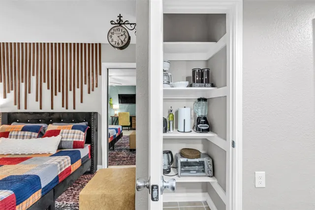 a view of living room kitchen and dining room