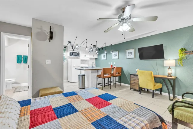 a workspace with furniture and a rug