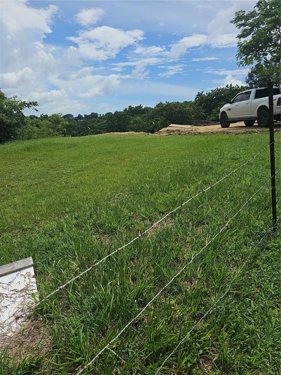 413 St Km 3.3 Int Bo Puntas Sec Martillo Rincon Prairie Rincon, PR 00677 - Photo 1 of 1 a view of a field with sitting space and a lake view