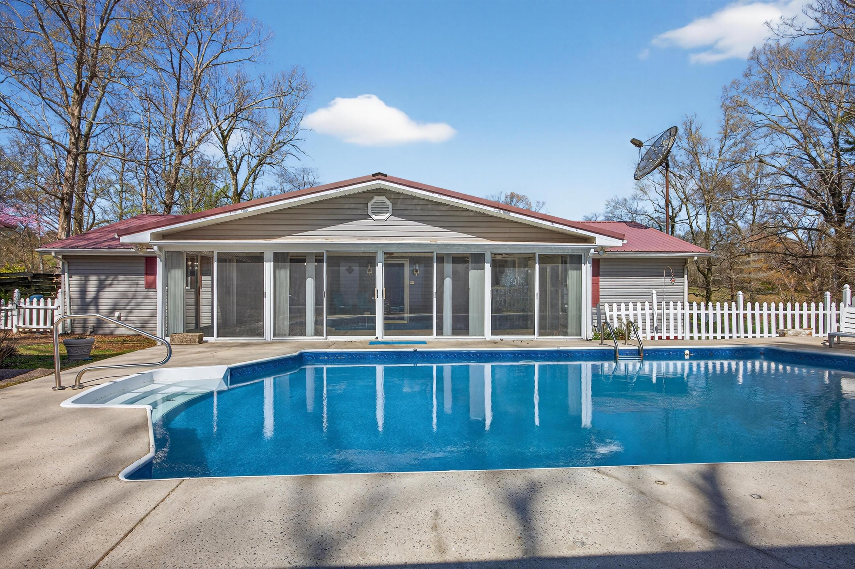 1052 Beaverdale Road Northeast Dalton, GA 30721 - Photo 14 of 42 Back View of Sunroom