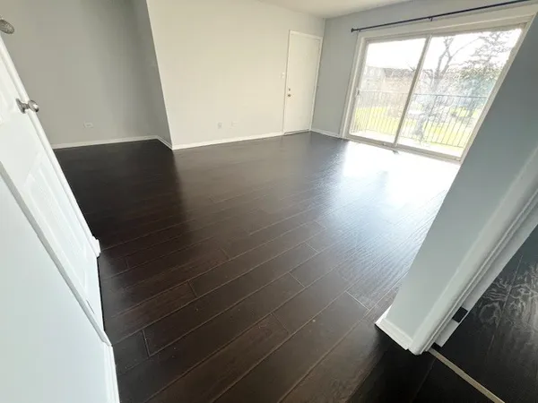 a view of a storage and utility room with washer and dryer