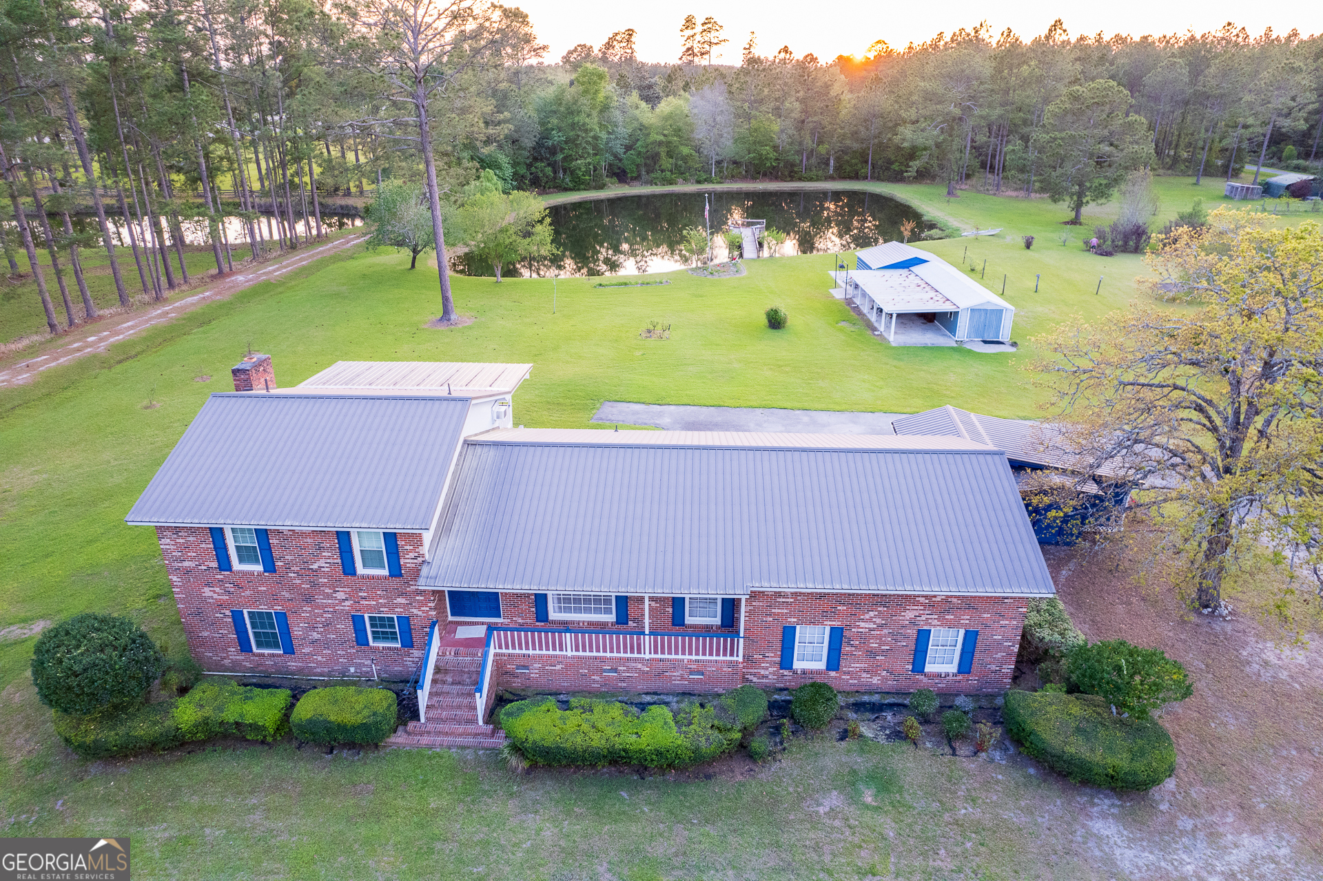 2110 Ware Street Blackshear, GA 31516 - Photo 1 of 57 an aerial view of a house with garden space and street view