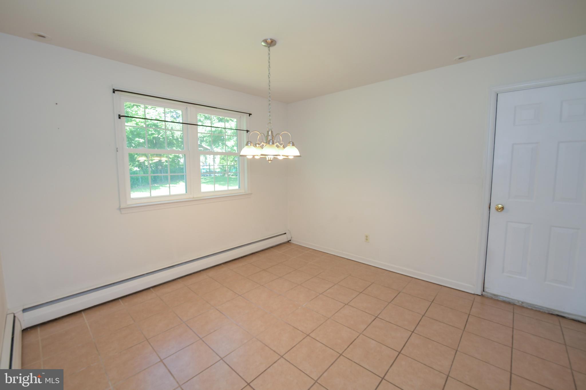 2 Broadale Road Doylestown, PA 18901 - Photo 17 of 56 a view of an empty room with a window
