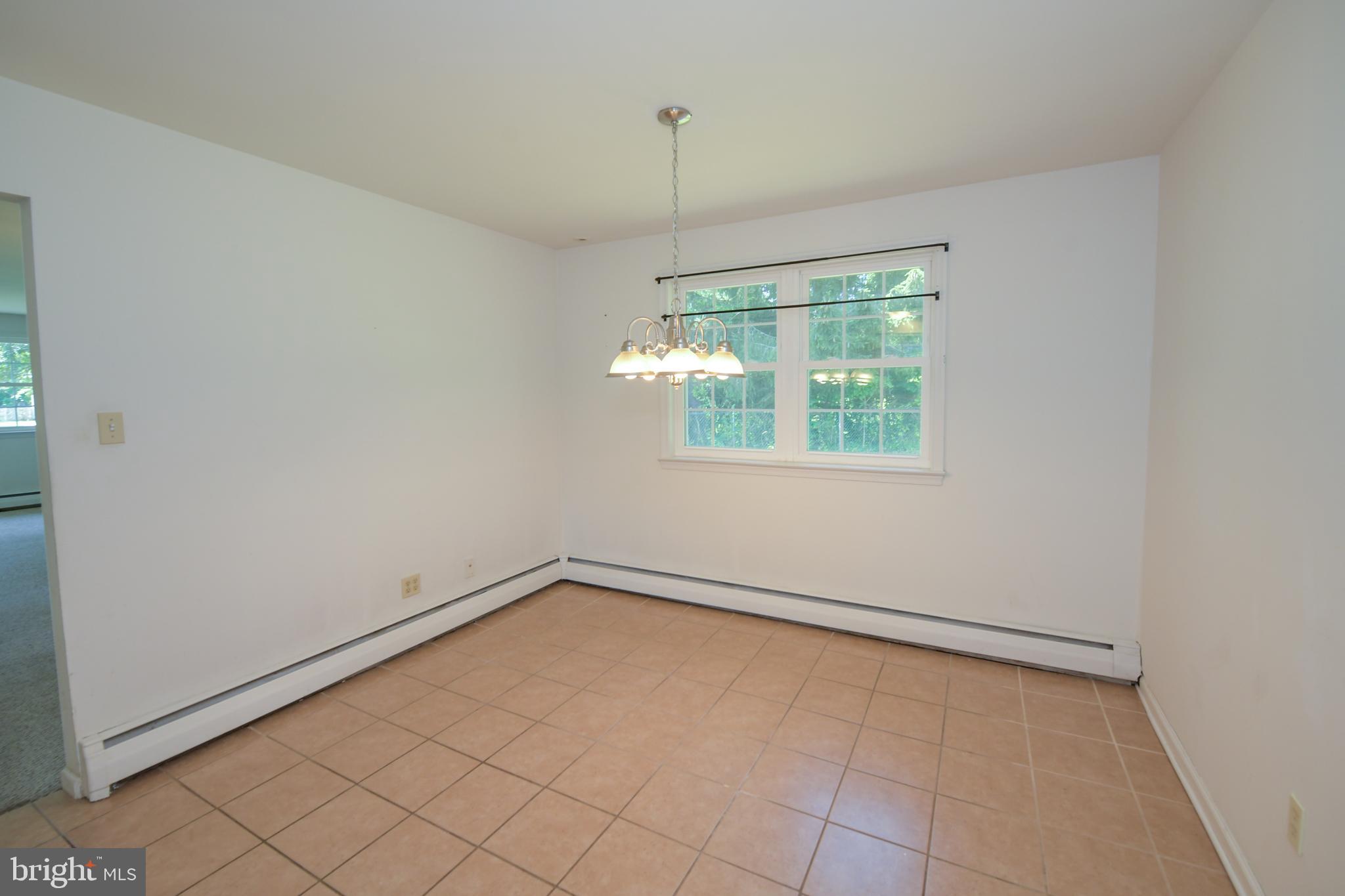 2 Broadale Road Doylestown, PA 18901 - Photo 18 of 56 wooden floor in an empty room with a window