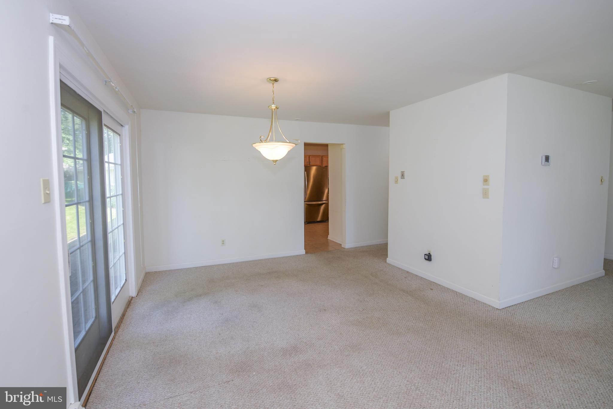 2 Broadale Road Doylestown, PA 18901 - Photo 29 of 56 a view of an empty room with window and chandelier