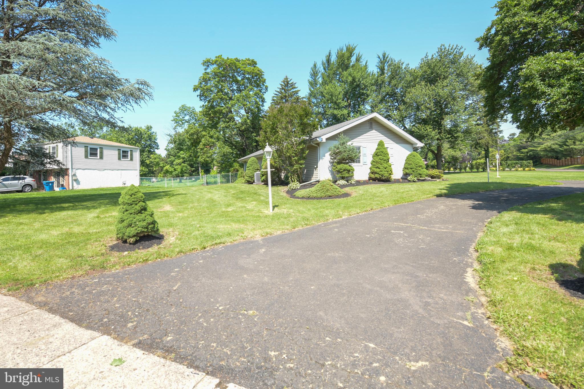 2 Broadale Road Doylestown, PA 18901 - Photo 3 of 56 a front view of a house with a yard and garage