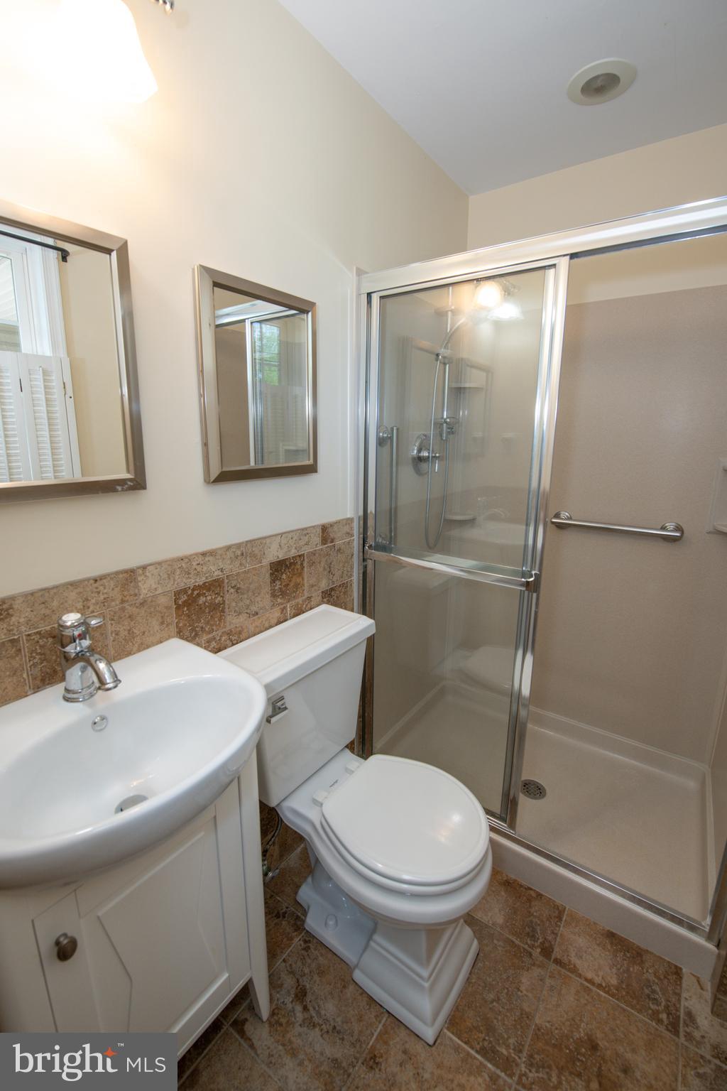2 Broadale Road Doylestown, PA 18901 - Photo 41 of 56 a bathroom with a sink toilet and shower