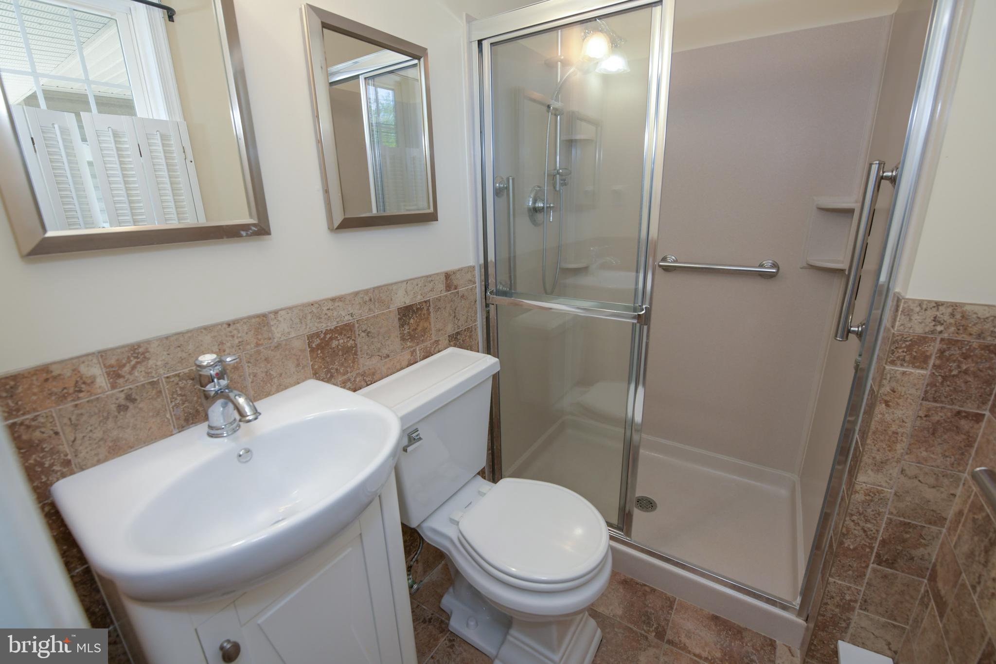 2 Broadale Road Doylestown, PA 18901 - Photo 42 of 56 a bathroom with a sink toilet and shower