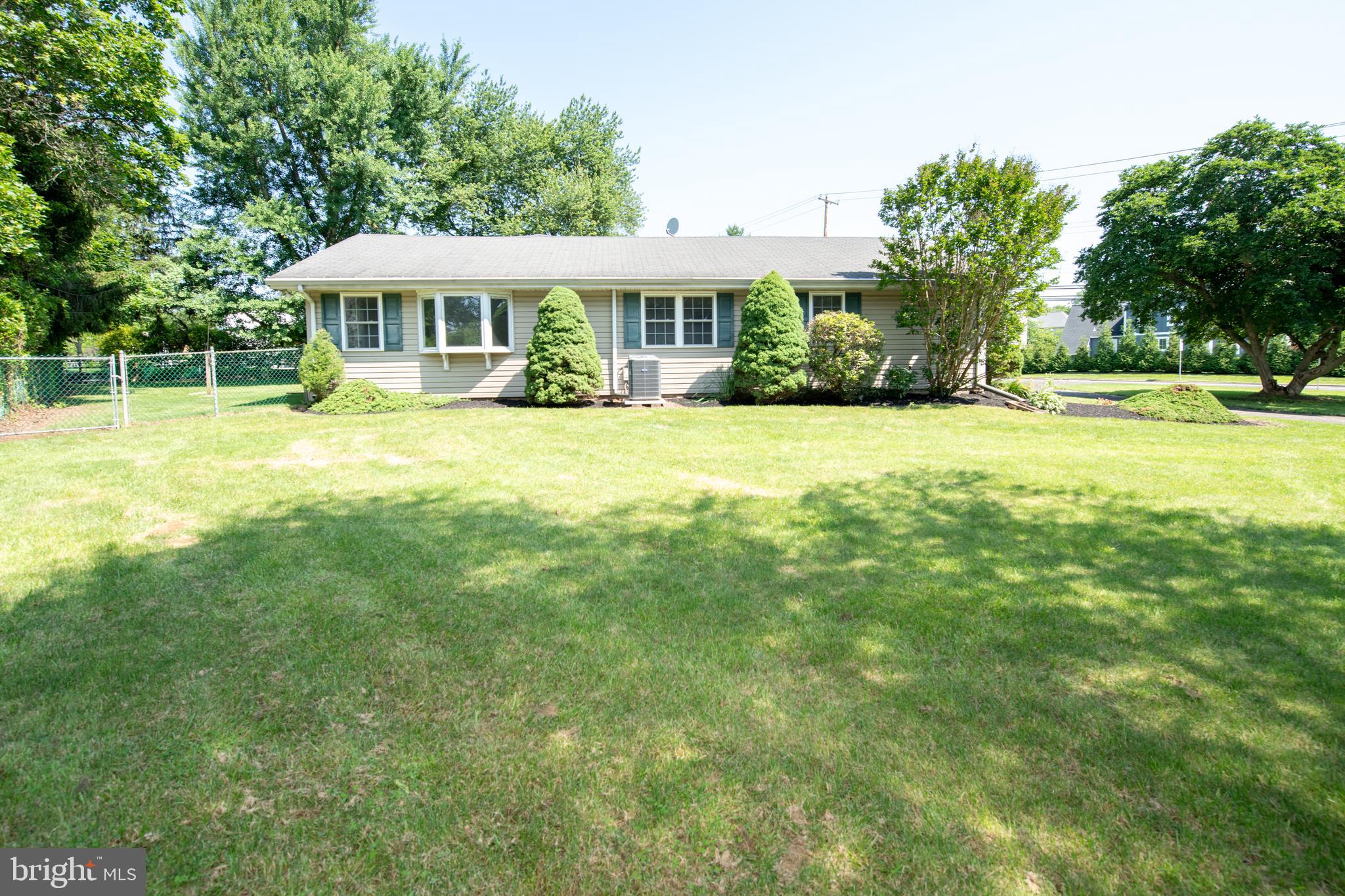2 Broadale Road Doylestown, PA 18901 - Photo 5 of 56 a front view of a house with swimming pool having outdoor seating