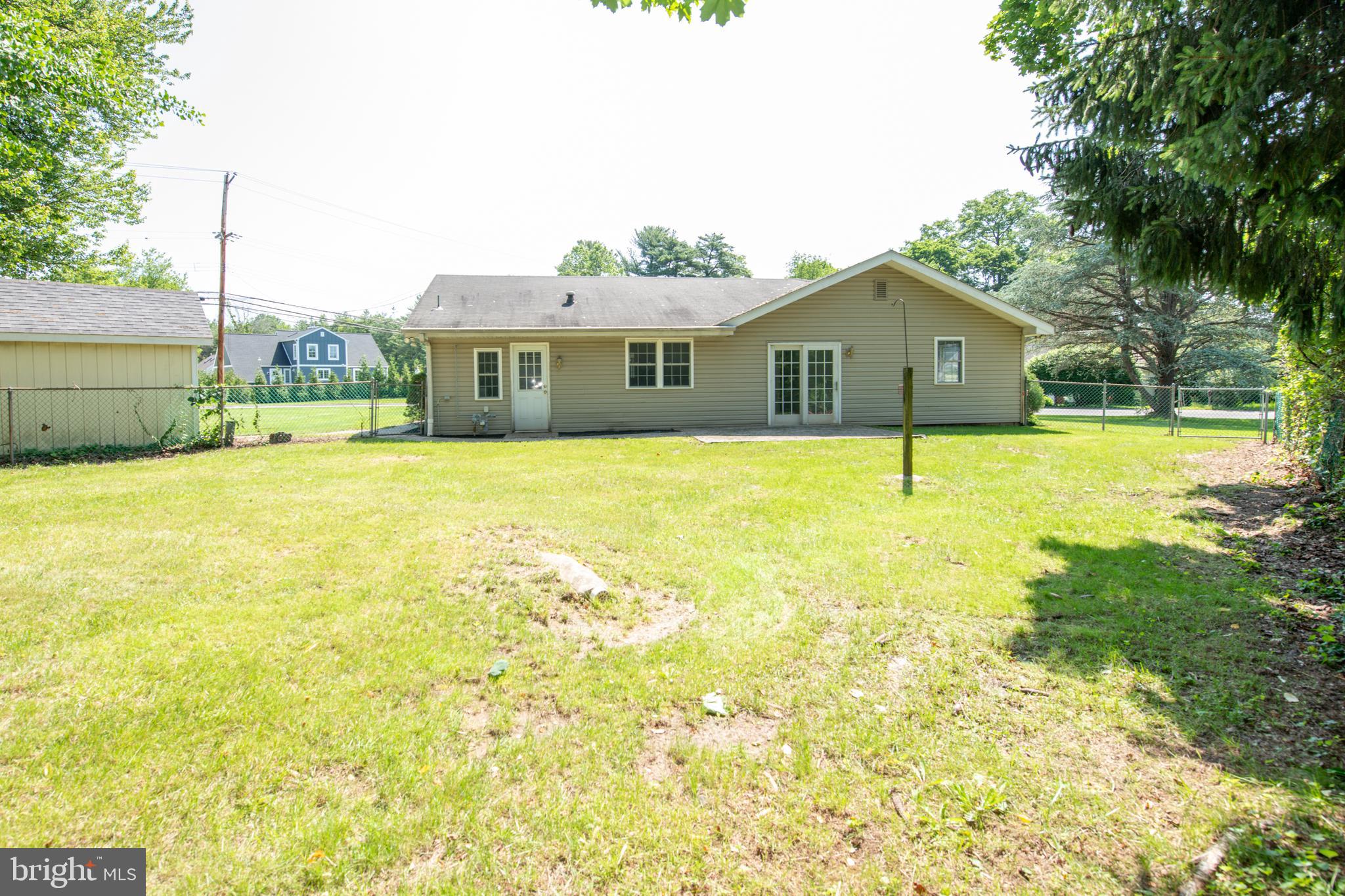 2 Broadale Road Doylestown, PA 18901 - Photo 10 of 56 a front view of a house with a yard